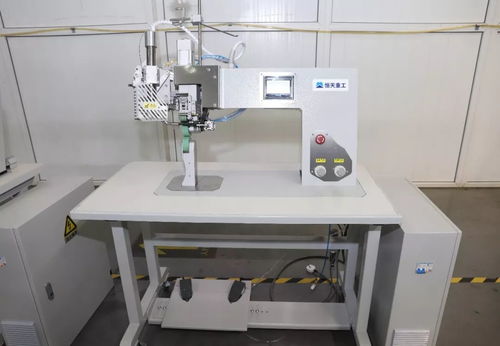 剛剛,國機集團奮戰9天研制的央企首臺醫用防護服壓條機通過國家工信部鑒定